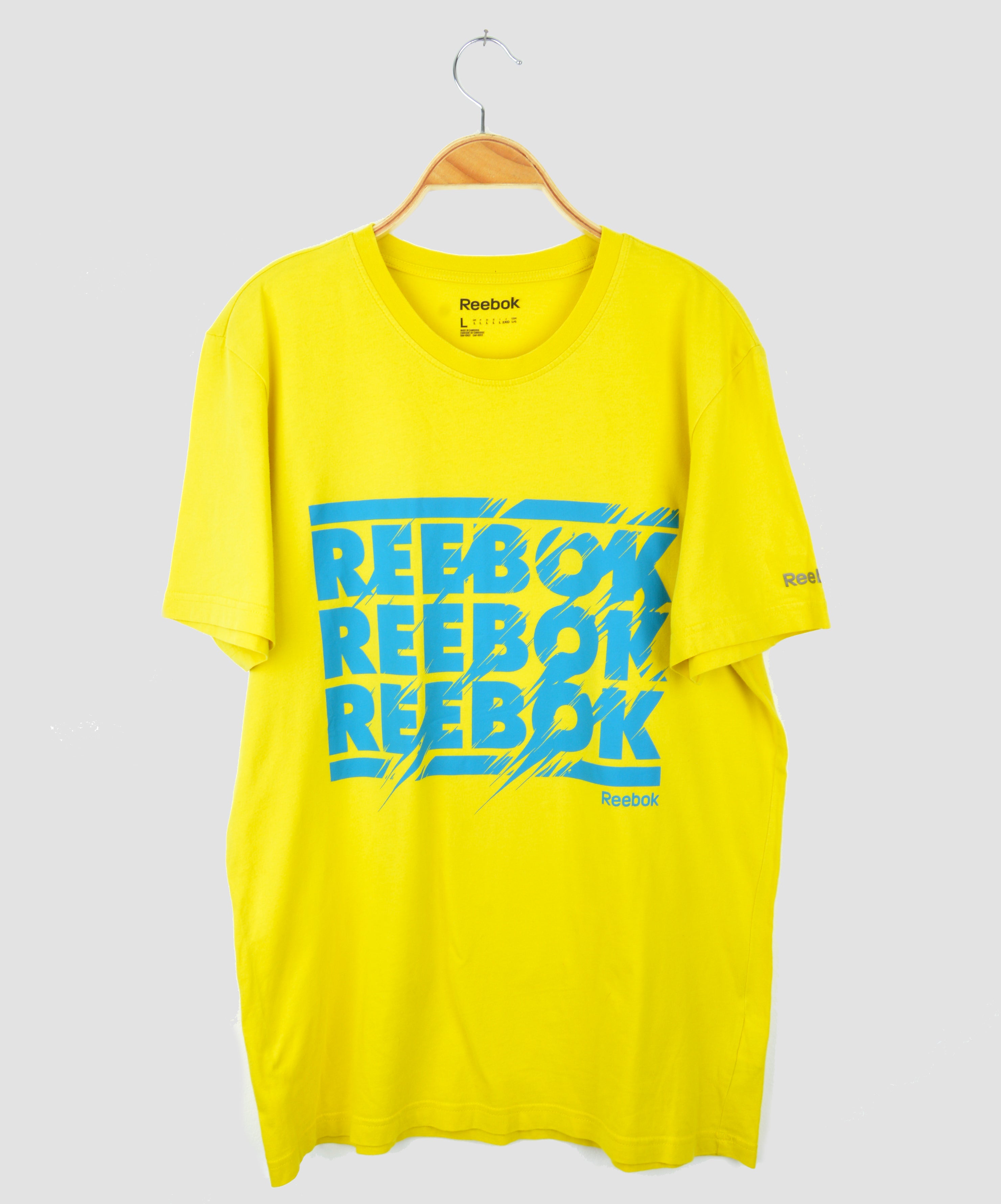 Vintage reebok t store shirt