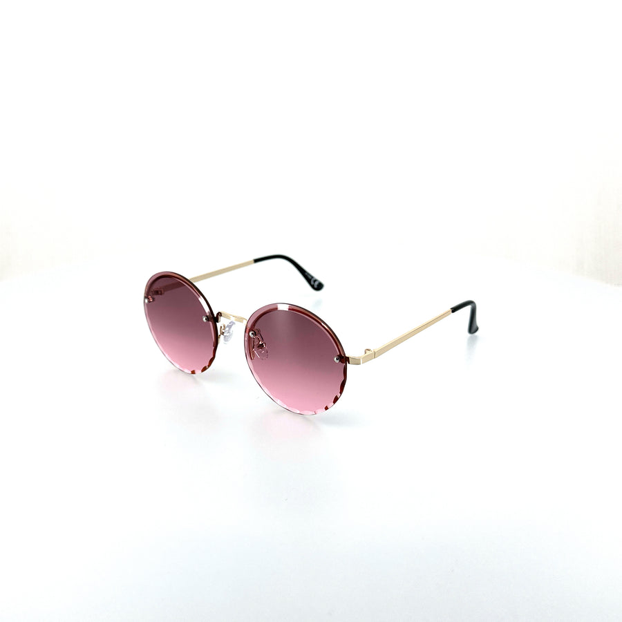 Kerek, keret nélküli napszemüveg, rózsaszín árnyalatú lencsével