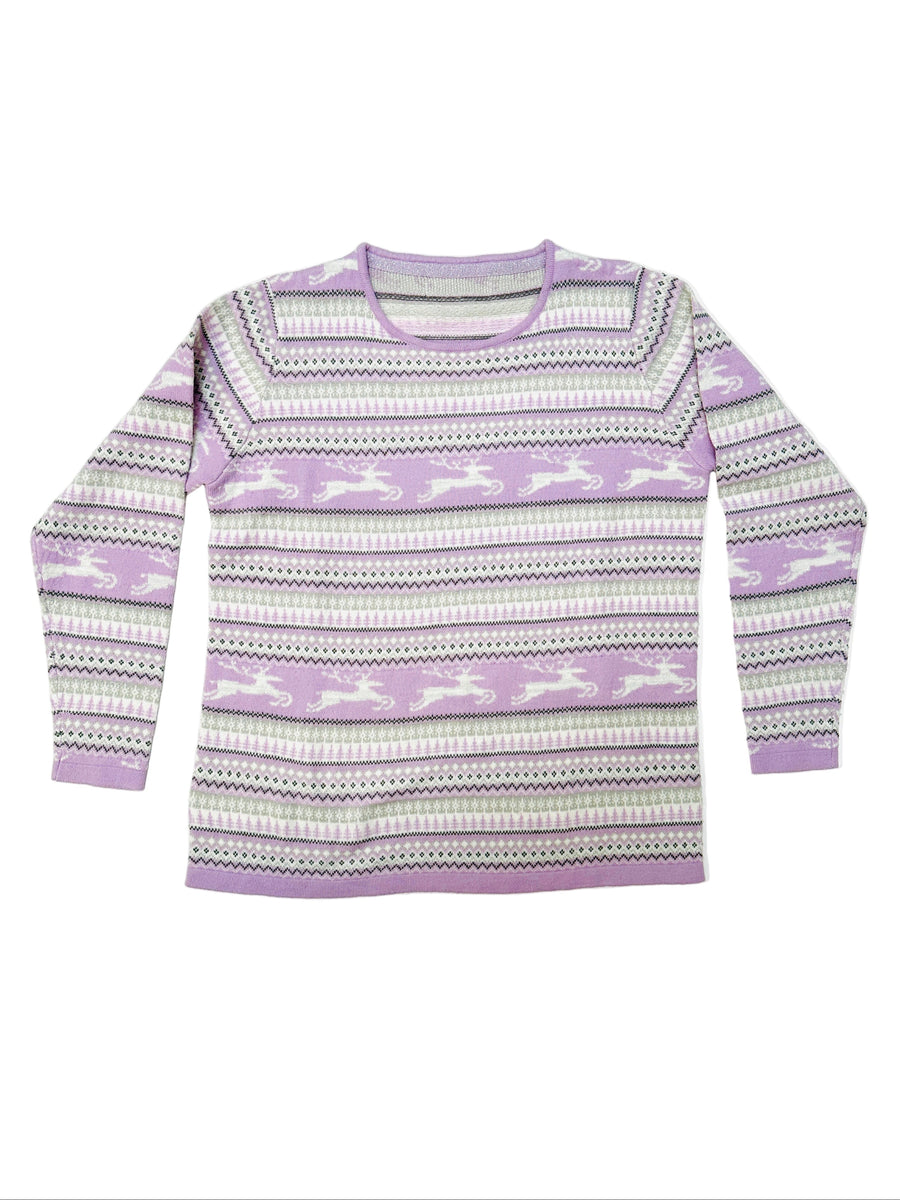 Ez a pulóver, egy használt darab a Szputnyik Shop gondosan válogatott vintage kollekciójából, amely már őrzi a karácsony varázslatos hangulatát. Ajándékozd meg a bolygót azzal, hogy idén egy preloved darabot vásárolsz!