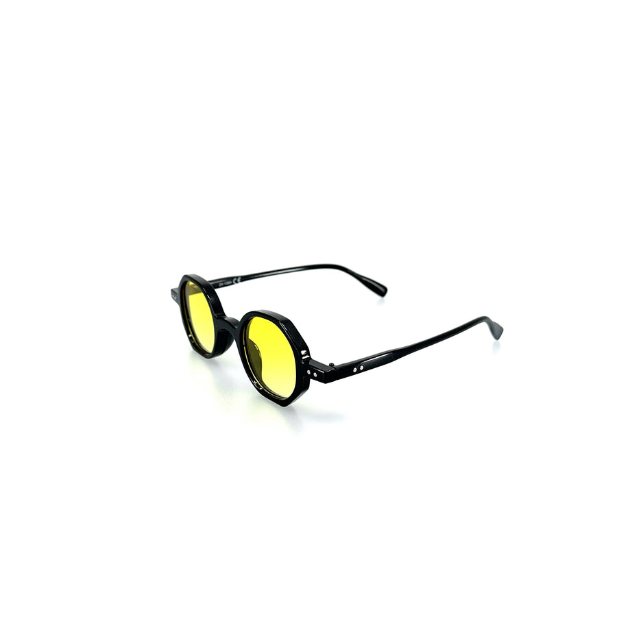 Sokszög alakú, citromsárga színű lencsés, műanyag napszemüveg.