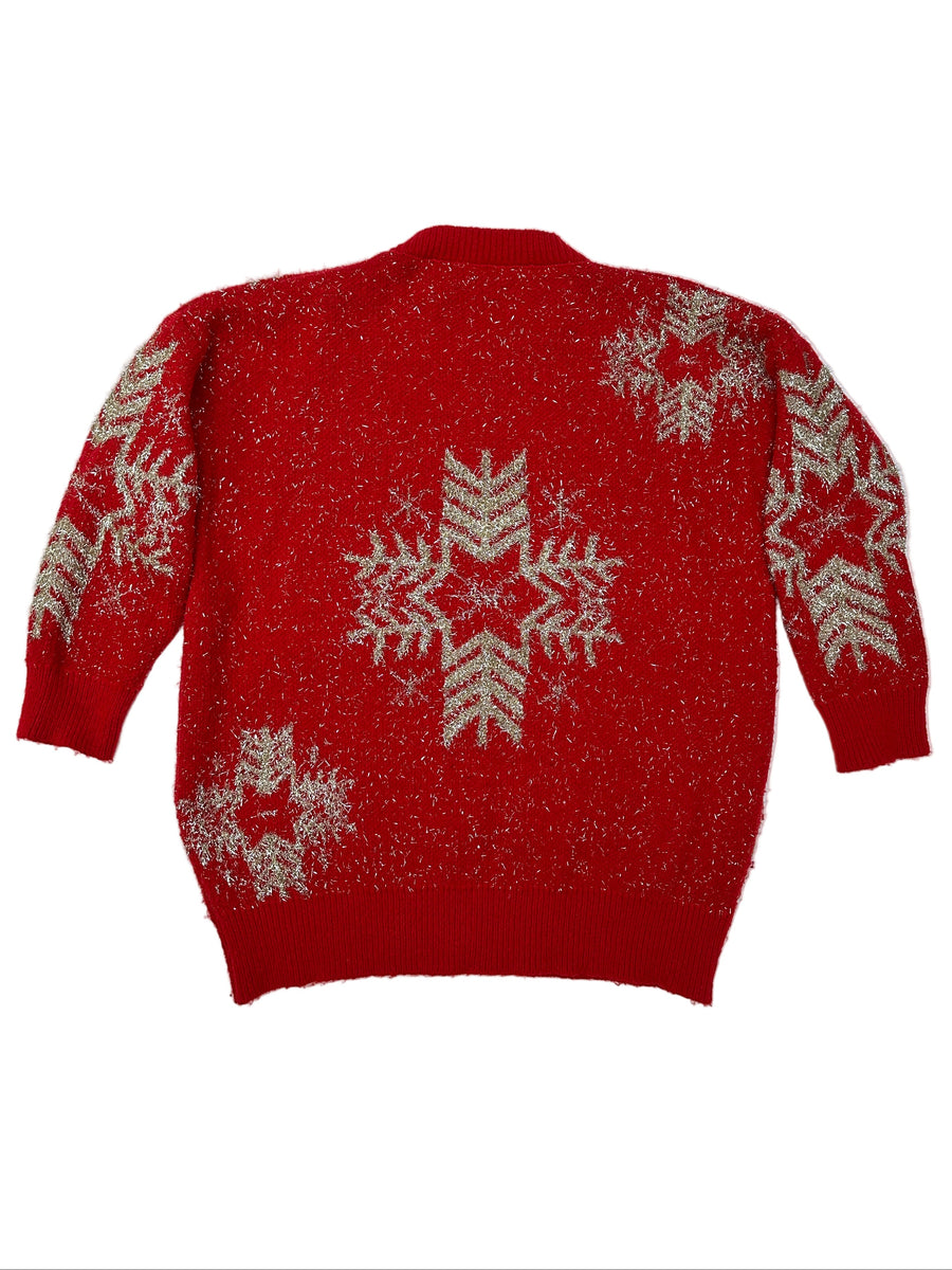 Ez a pulóver, egy használt darab a Szputnyik Shop gondosan válogatott vintage kollekciójából, amely már őrzi a karácsony varázslatos hangulatát. Ajándékozd meg a bolygót azzal, hogy idén egy preloved darabot vásárolsz!