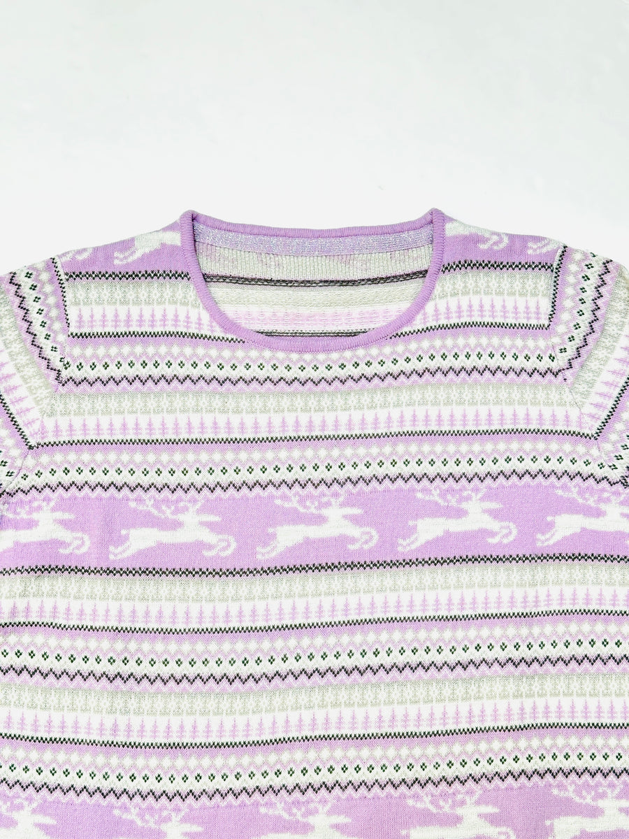 Ez a pulóver, egy használt darab a Szputnyik Shop gondosan válogatott vintage kollekciójából, amely már őrzi a karácsony varázslatos hangulatát. Ajándékozd meg a bolygót azzal, hogy idén egy preloved darabot vásárolsz!