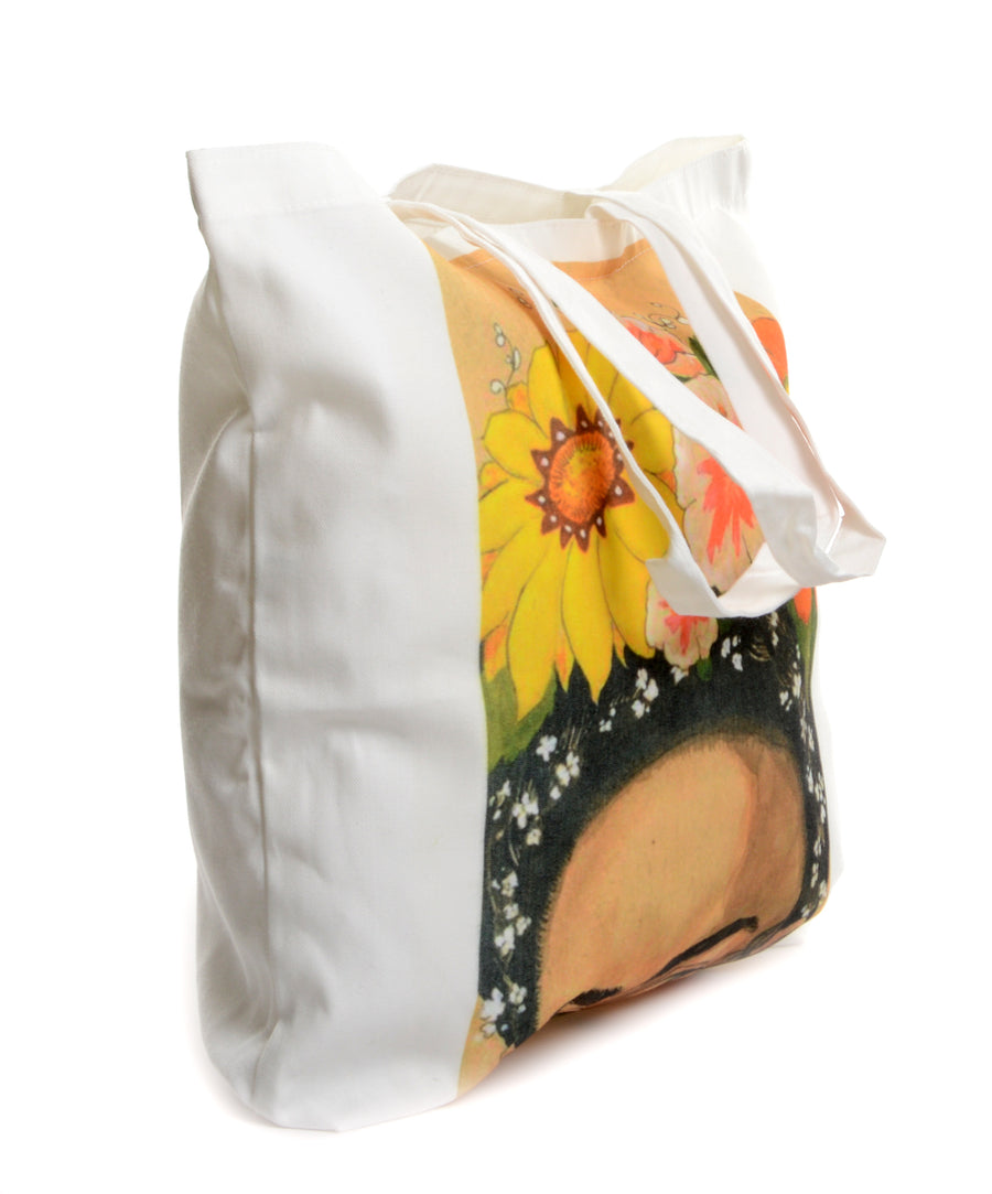 Egy rekeszes, vászon totebag Frida Kahlo mintával.